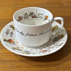 Jon Anton, England fine bone china “The Taltos” teacup & saucer